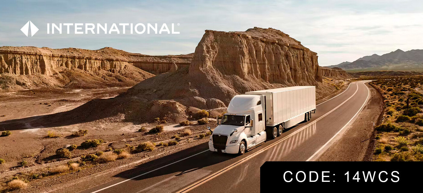 An International Truck driving in the desert, with the International Logo in the top left-hand corner, and the text "CODE: 14WCS" in the bottom right-hand corner.