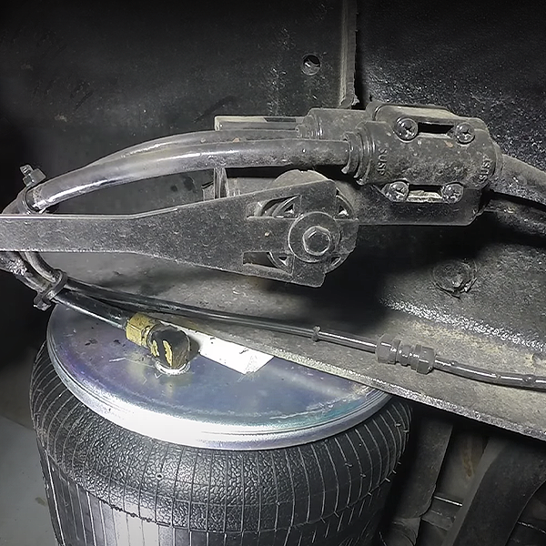 1500 Series Chassis Leveling Valve installed above airbag