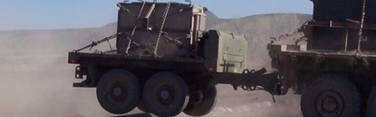 USMC Tactical Trailer being towed at high speeds over a bump
