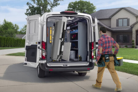 A Link Swivel Ramp swiveled 90 degrees outside of a Ford Transit Cargo Van.