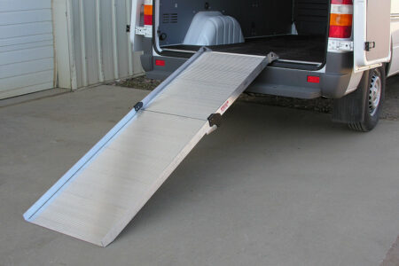 The Link portable ramp deployed from the back of a cargo van
