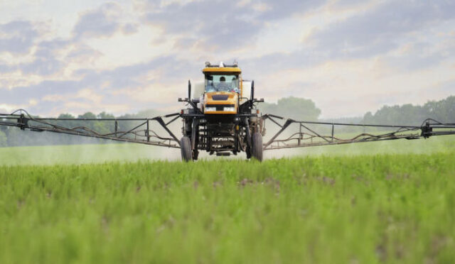 A field sprayer in a farm field