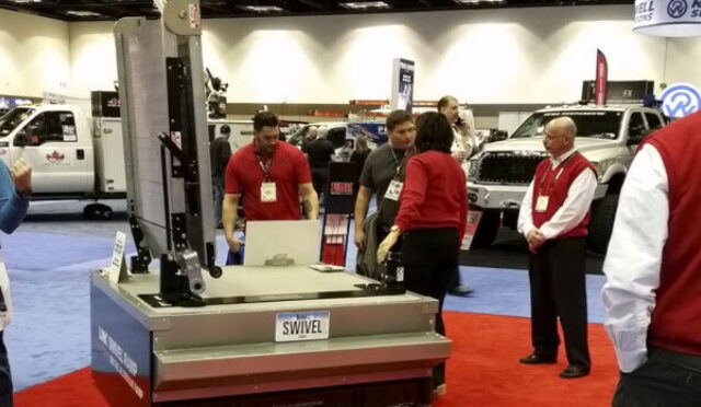 Link representatives at the 2016 NTEA Work Truck Show with the Swivel Ramp