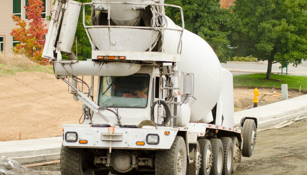 A cement mixer on a job site.