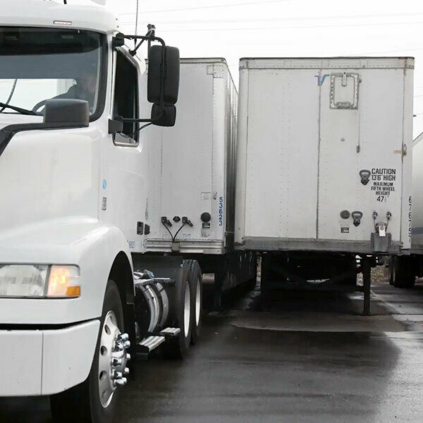 A truck pulling out a trailer for access to a the landing gear